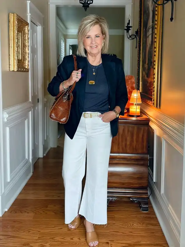18 Retirement Party Outfits for Women Over 40 (Casual to Formal) 3 Navy Blazer With White Wide Leg Jeans