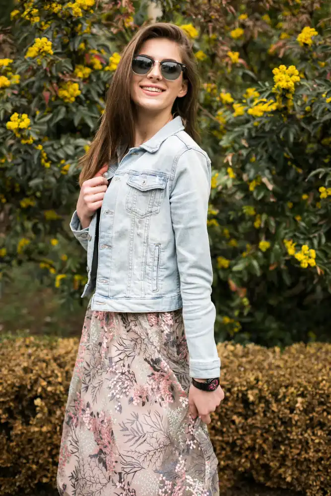 How to Wear a Maxi Dress Over 40 (5 Ways) 5 Layer a cropped denim jacket that ends at your natural waist