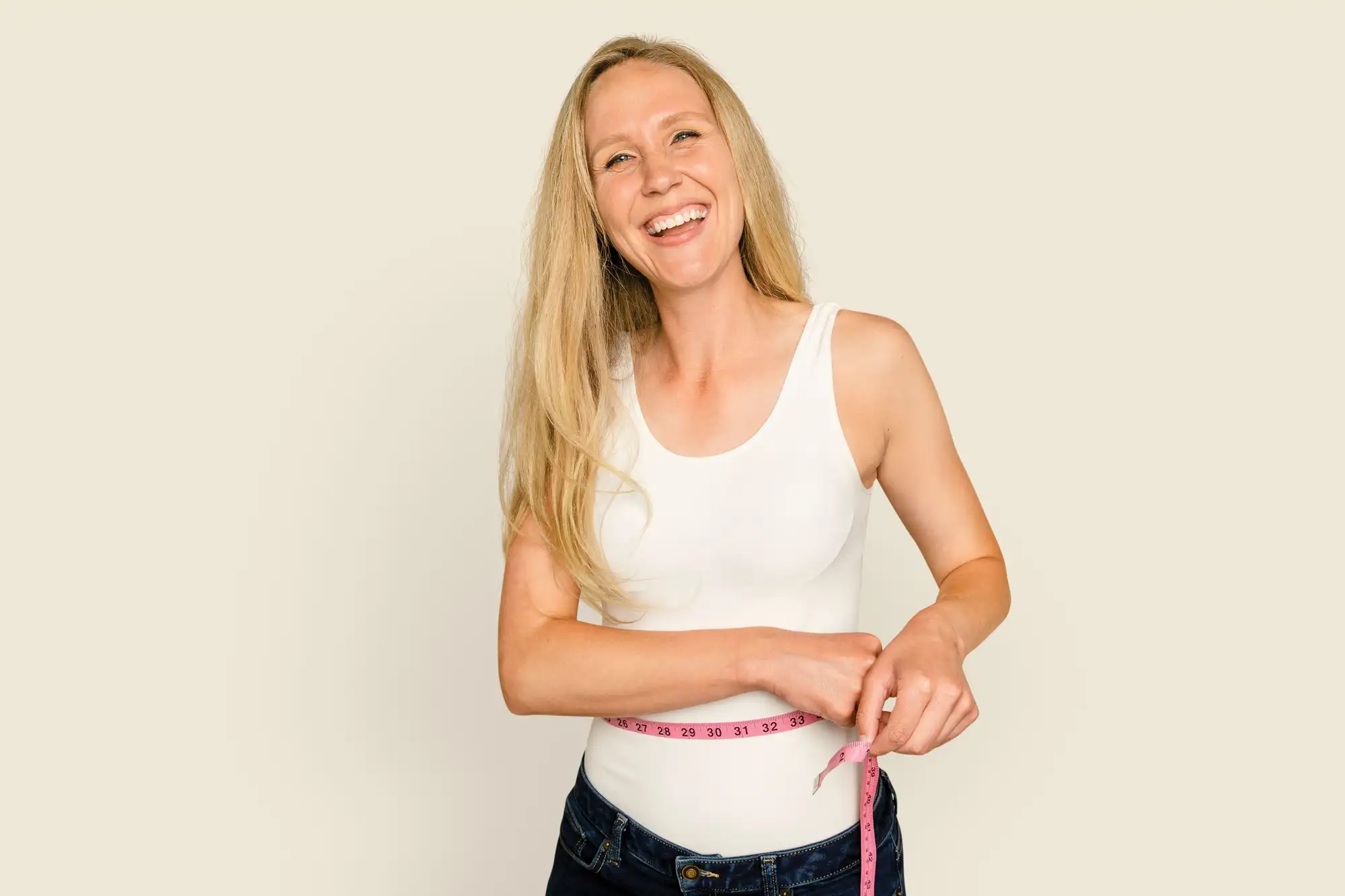 Why Nothing Looks Good on Me Anymore (Over 40 Guide) 3 Taking waist and ribcage measurements with a soft tape measure at home