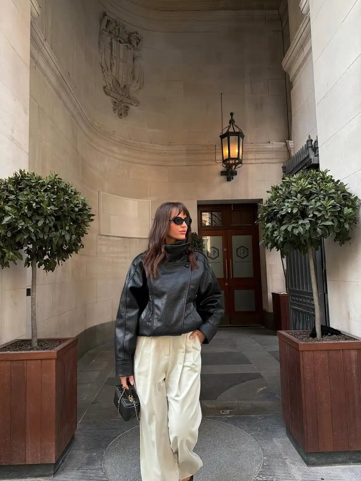 15 Leather Jacket Outfits for Women Over 40 That Actually Work 7 6. Asymmetric Collar Jacket with Cream Trousers