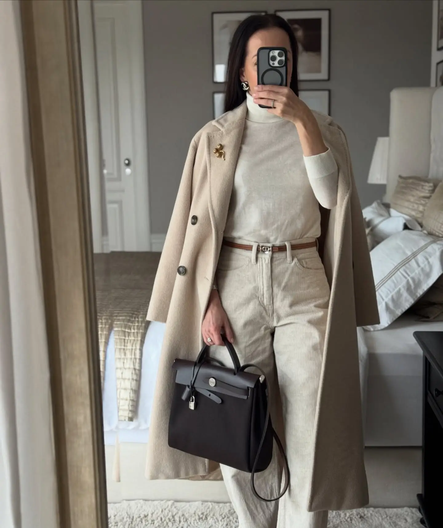 15 Cashmere Outfits for Women Over 40 That Feel Cozy and Polished 5 4. Cream Turtleneck and Corduroy Under a Draped Camel Coat