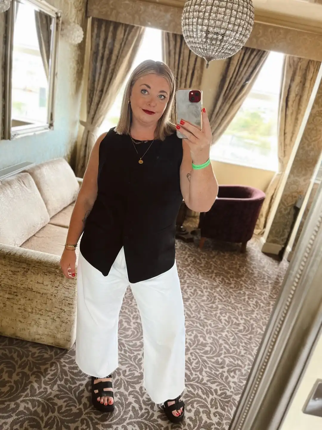 1. Black Vest And White Wide Leg Trousers