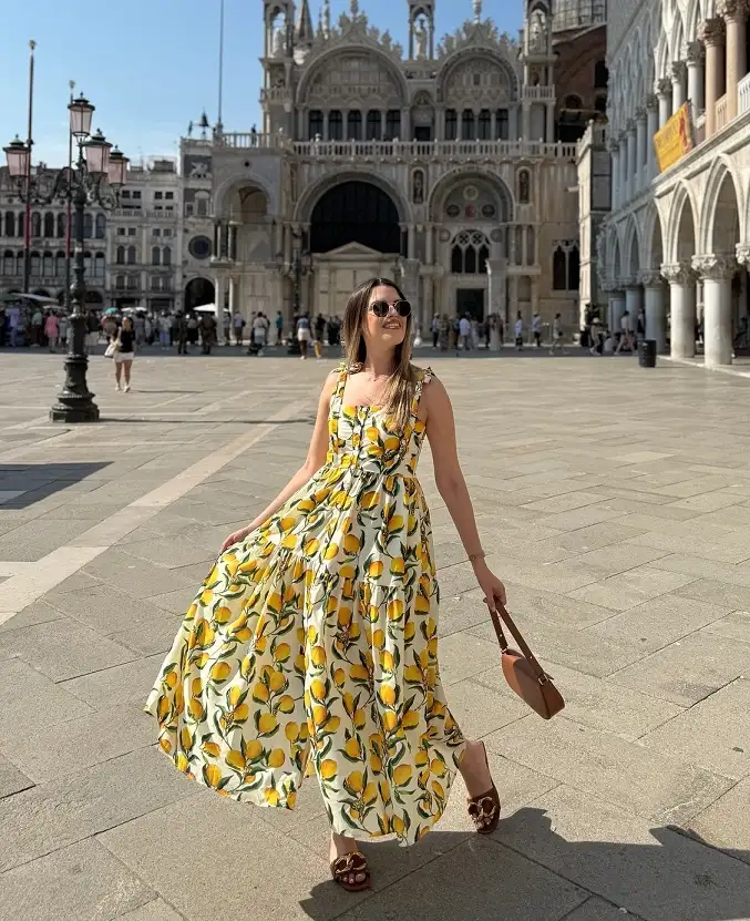 17 Italy Vacation Outfits for Women Over 40 That Look Effortlessly Chic 14 Lemon Print Maxi Dress with Tie Straps