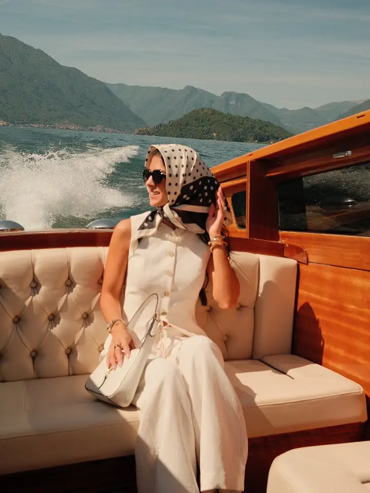 17 Italy Vacation Outfits for Women Over 40 That Look Effortlessly Chic 16 Cream Tailored Vest and Wide Trousers