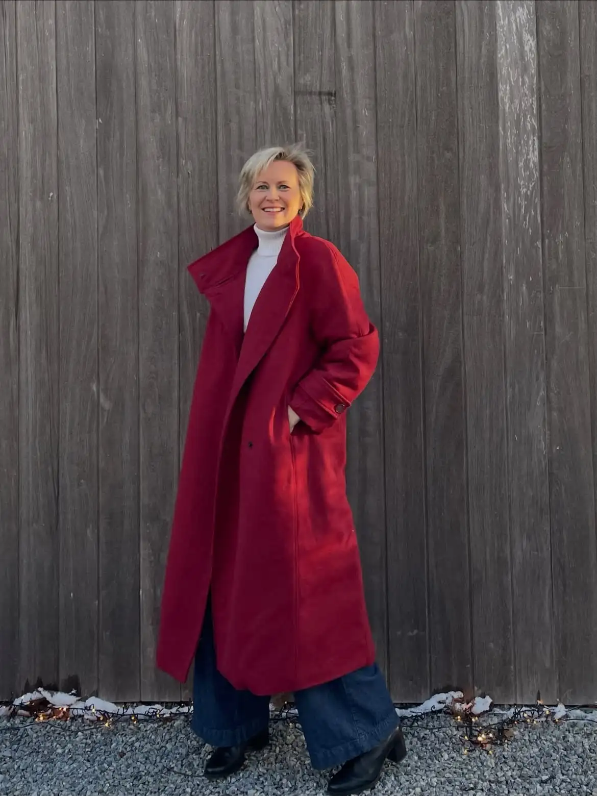 18 Wool Coat Outfits for Women Over 40 You Can Copy This Winter 18 17. Long Red Wool Coat With a White Turtleneck and Dark Wide Leg Jeans