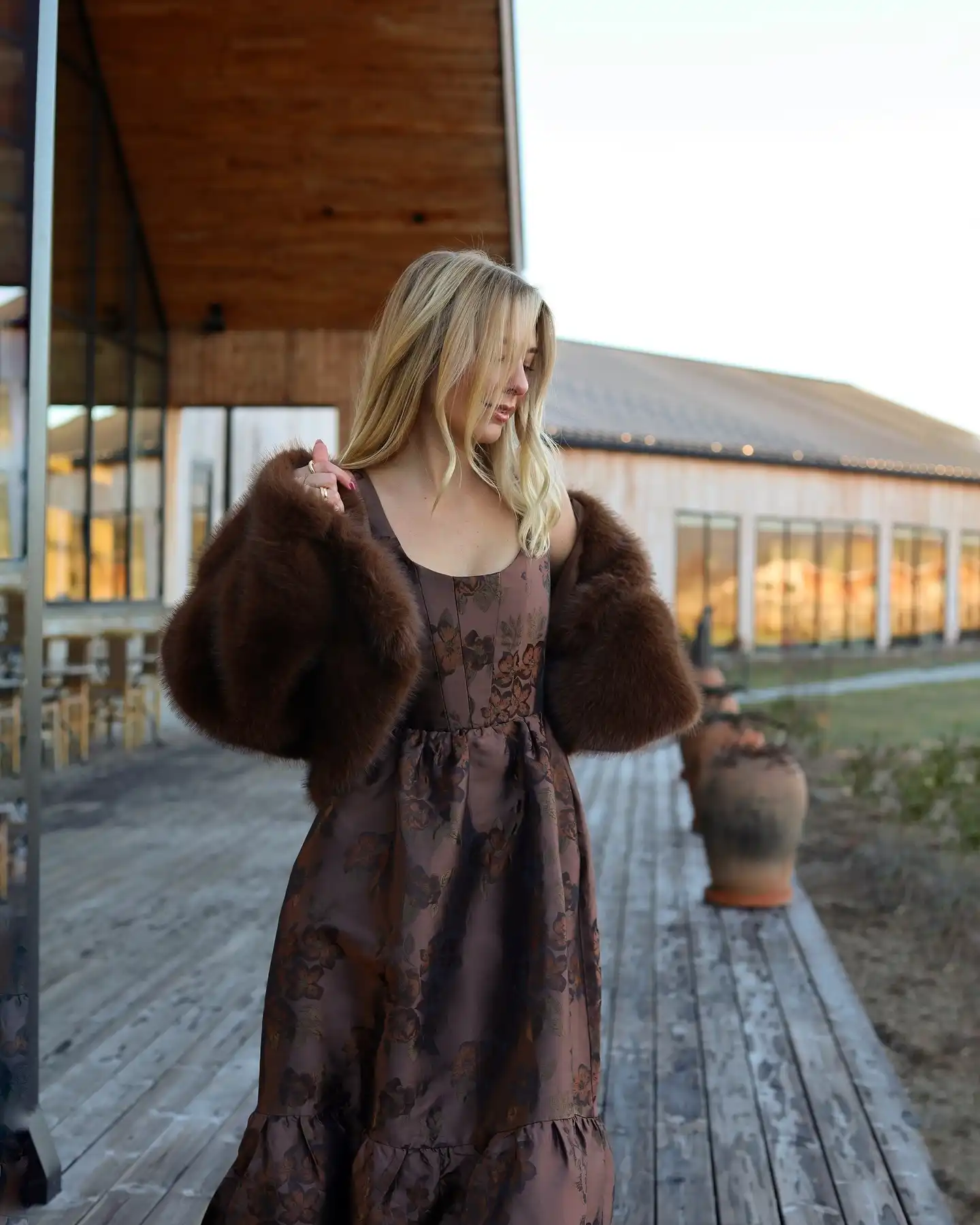 9. Brocade Dress with Faux Fur Sleeves