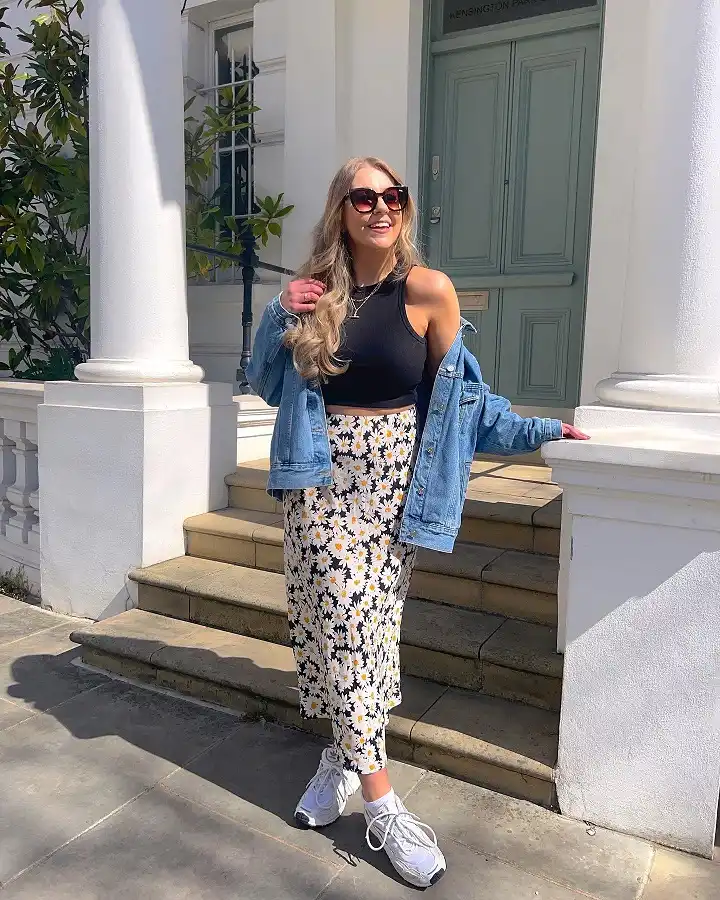 16 Spring Transitional Outfits Over 40 (Winter-to-Spring) 5 Daisy Print Midi Skirt With a Denim Jacket
