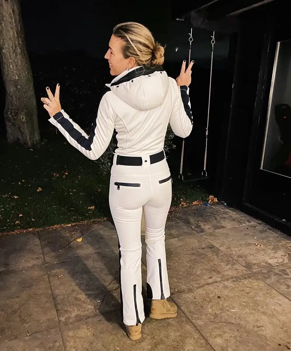 8. White Fitted Jacket and Pants With Navy Trim and Tan Boots