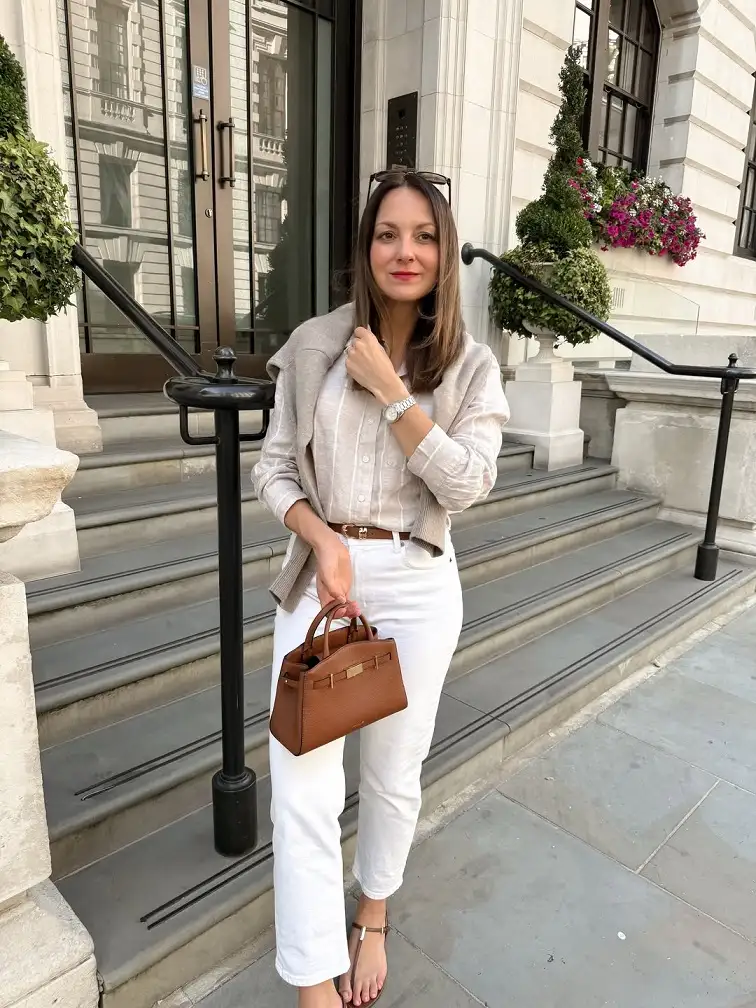 15 Chic Outfits for Women Over 40 You Can Copy This Week 16 Tonal Neutrals With White Jeans and a Tan Handbag