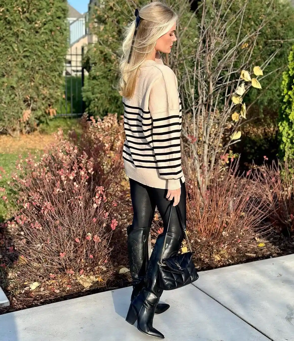 15. Striped Sweater with Faux Leather Leggings