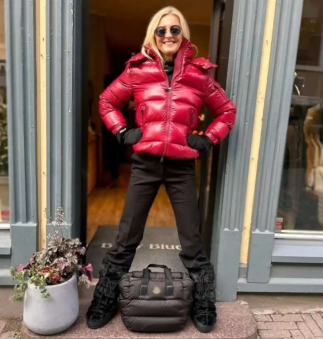 9. Glossy Red Puffer With Black Trousers and Fur Trim Boots