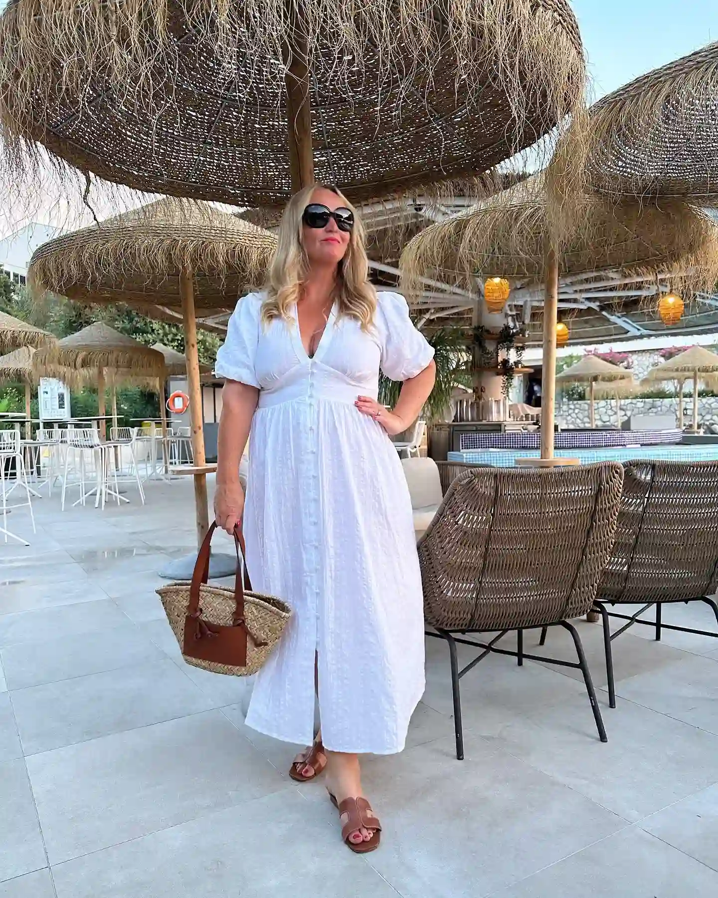 19 Holiday Outfits for Women Over 40 That Work for Parties, Dinners, and Sunny Trips 3 2. White Button Front Midi for a Sunny Christmas