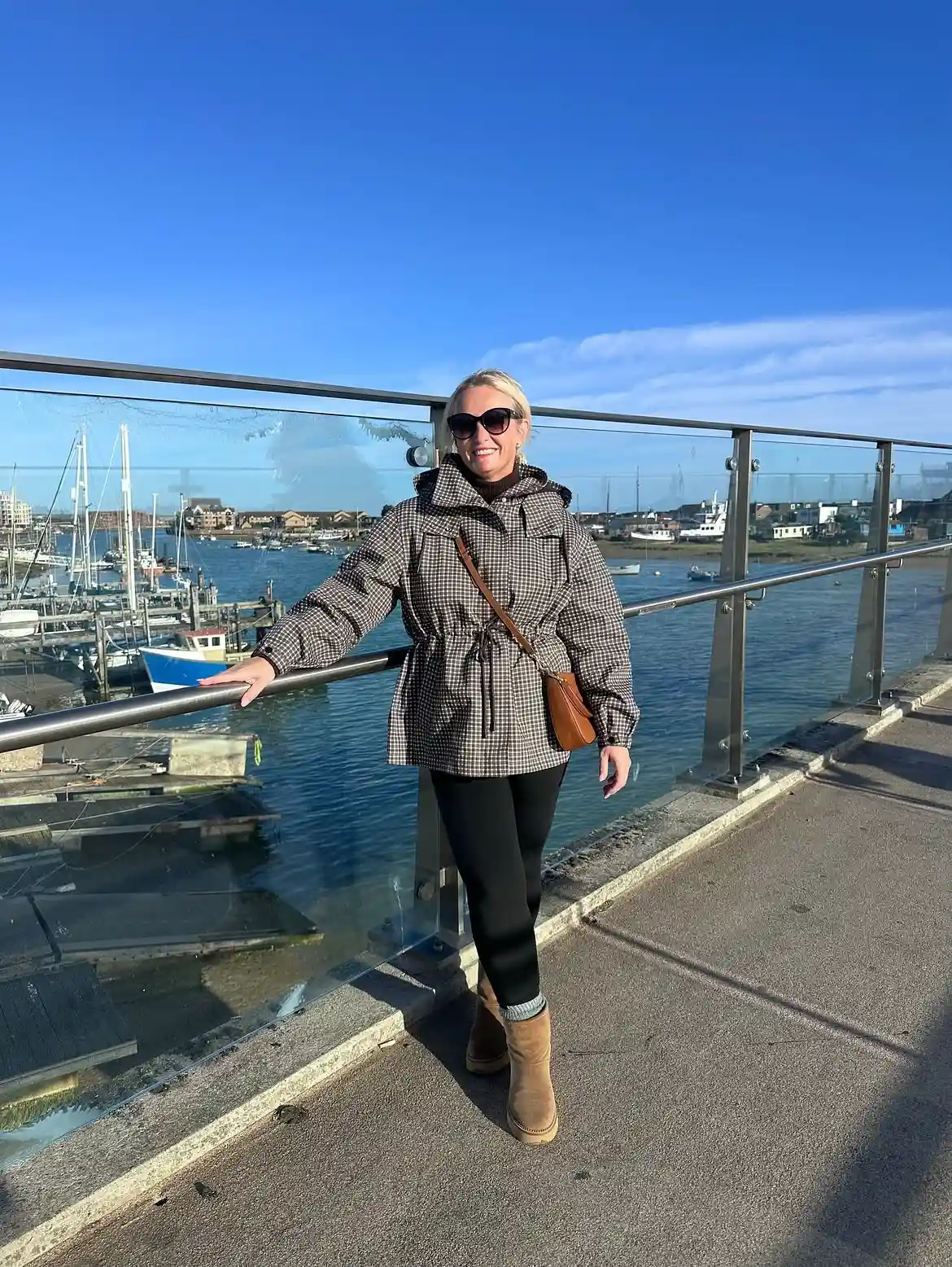 15 Puffer Jacket Outfits for Women Over 40 That Actually Look Chic 16 15. A Checked Puffer Jacket That Reads More Coat Than Ski Wear