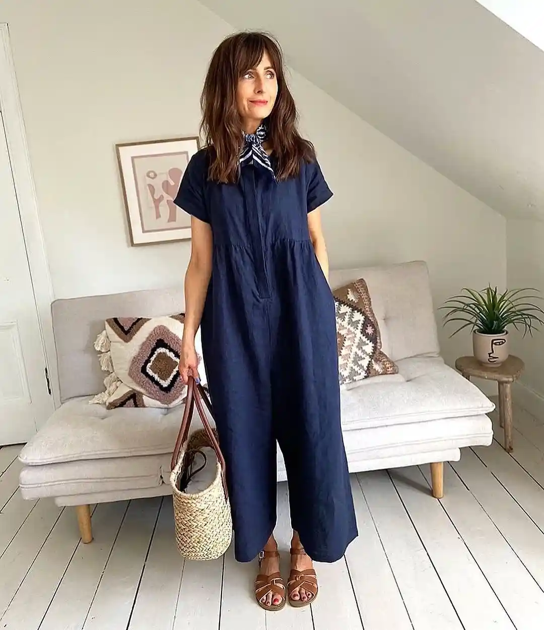 15 Linen Outfits for Women Over 40 That Feel Easy and Look Polished 14 13. Navy Short Sleeve Jumpsuit With a Neck Scarf