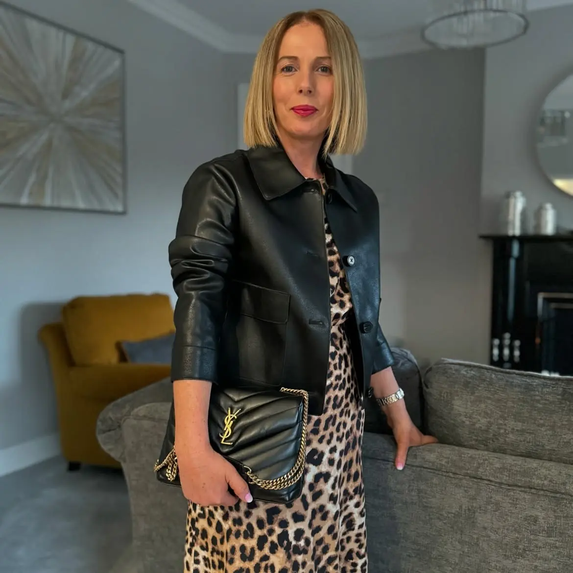 17 Leather Outfits Over 40 (Not Costumey) 9 8. Boxy Leather Jacket over Leopard Print Dress
