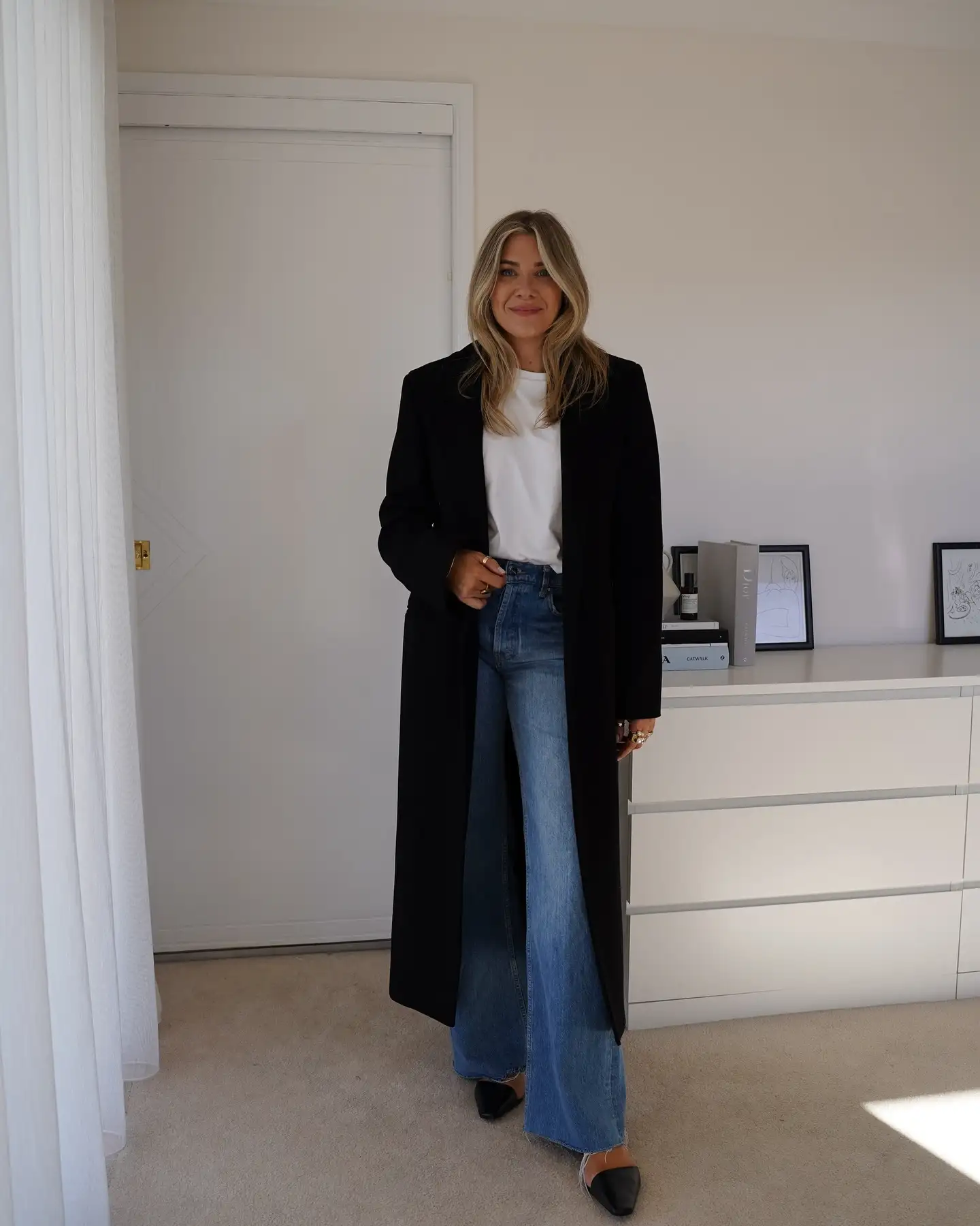 Fall Capsule Wardrobe for Women Over 40 (20 Pieces) 2 1. Long Black Wool Coat