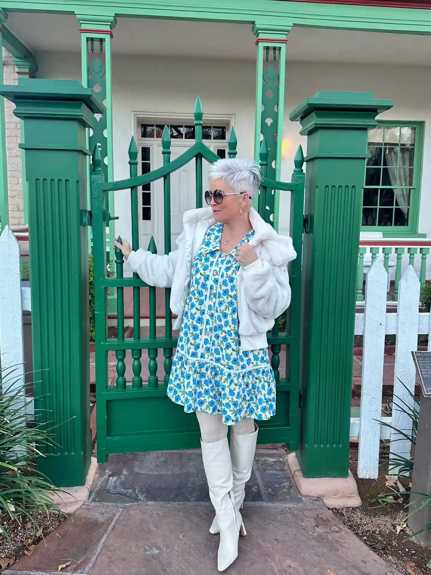 17. Floral Dress with a White Faux Fur Jacket