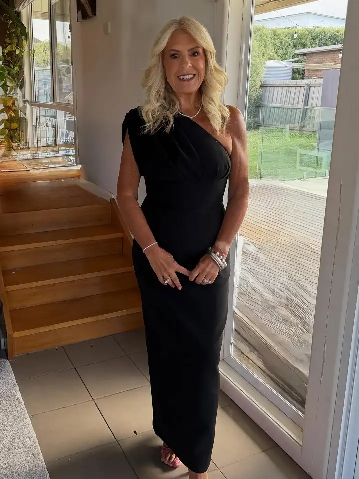 A Black One Shoulder Column Dress for Evening