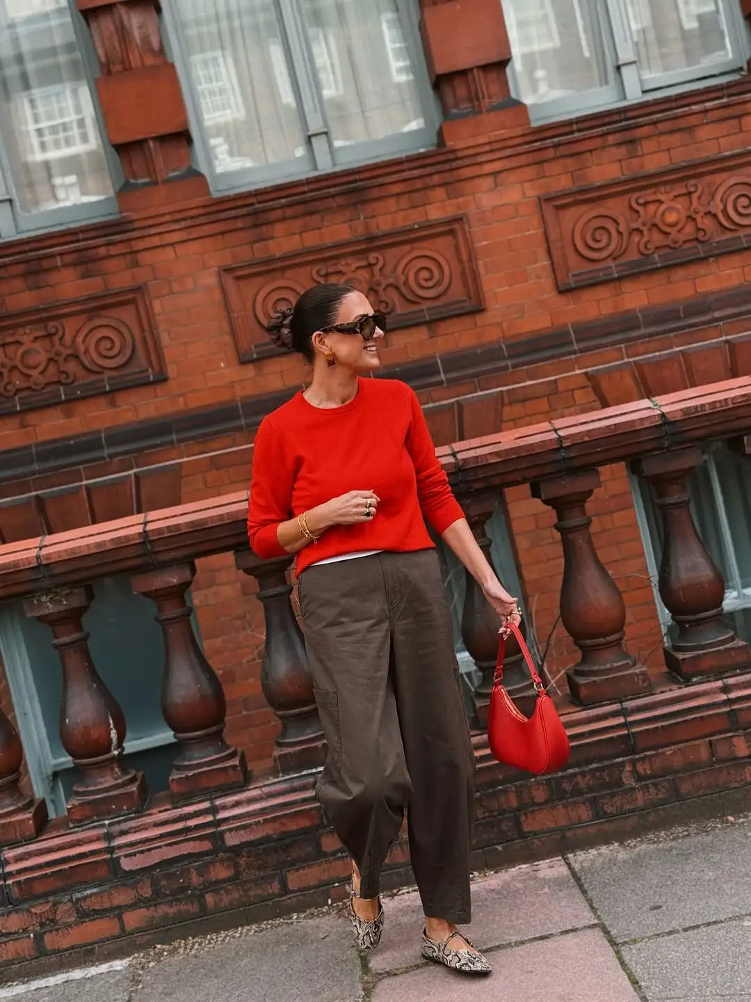 15 Cashmere Outfits for Women Over 40 That Feel Cozy and Polished 2 1. Red Crewneck With Olive Cargo Pants
