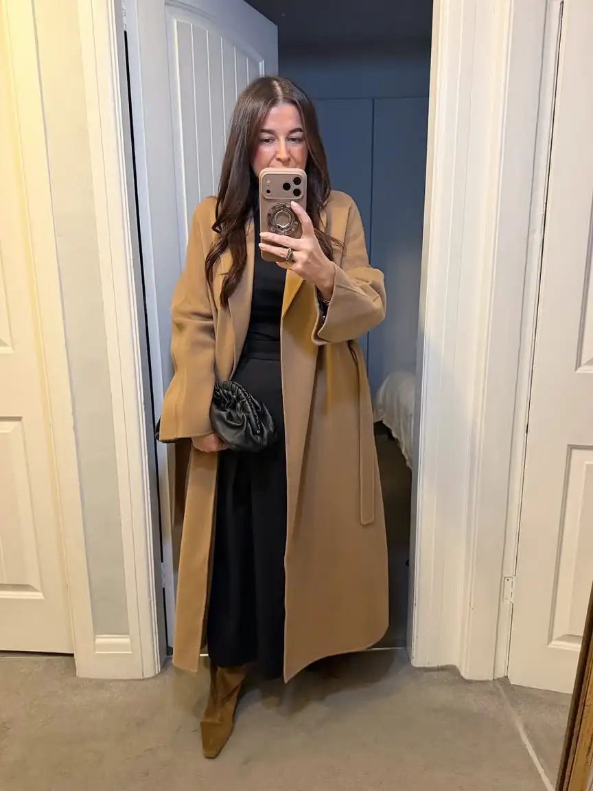20 Chic Winter Outfits for Women Over 40 That Aren't Frumpy 6 Camel Wrap Coat With a Long Black Skirt