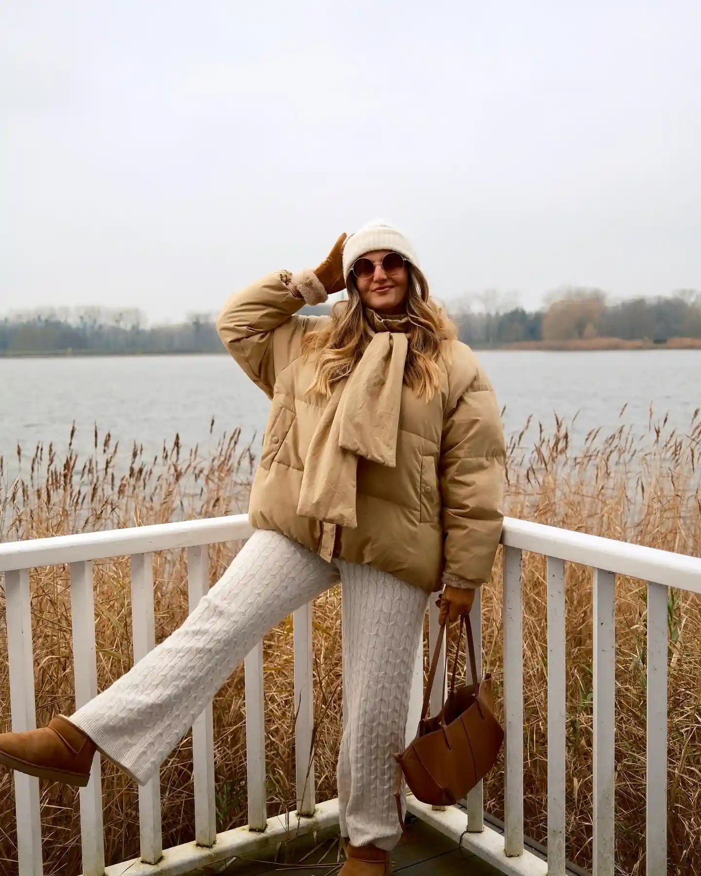 15 Puffer Jacket Outfits for Women Over 40 That Actually Look Chic 10 9. Camel Puffer, Cable Knit Pants, and a Cozy Head to Toe Palette