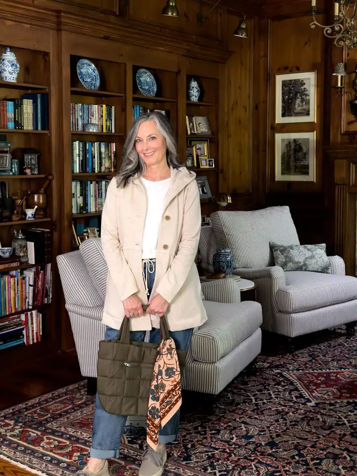 20 Chic Winter Outfits for Women Over 40 That Aren't Frumpy 19 Hooded Knit Jacket With Cuffed Jeans