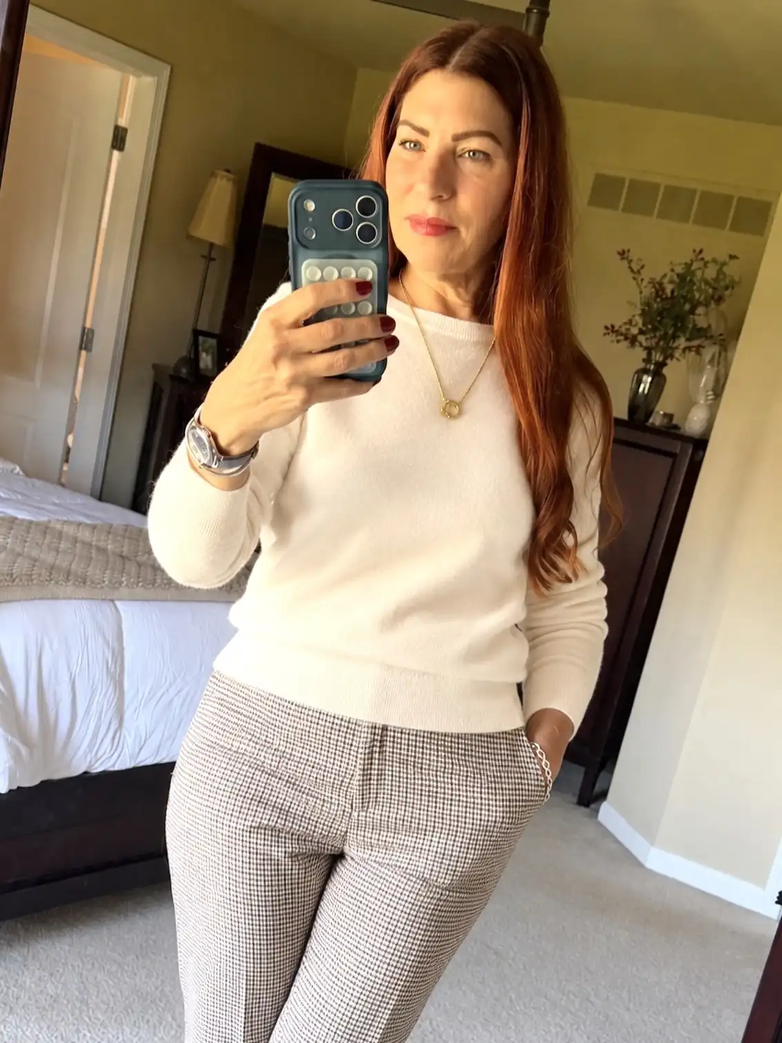 15 Cashmere Outfits for Women Over 40 That Feel Cozy and Polished 6 5. Cream Cashmere Sweater With Micro Check Trousers