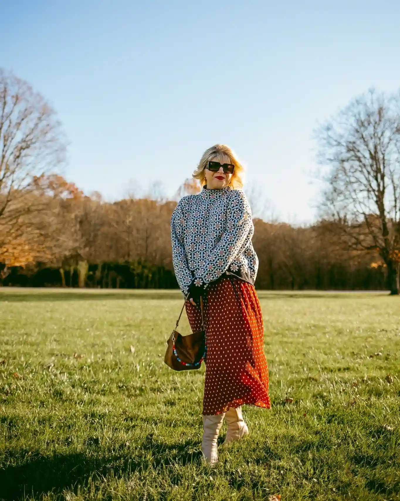 6. Floral Sweater with Polka Dot Pleated Skirt