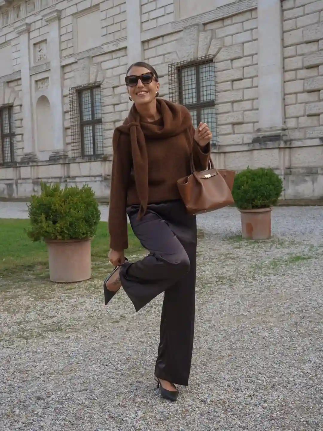 12. Brown Knit Layers With Dark Satin Pants