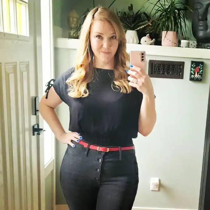 Black Blouson Top with a Red Skinny Belt