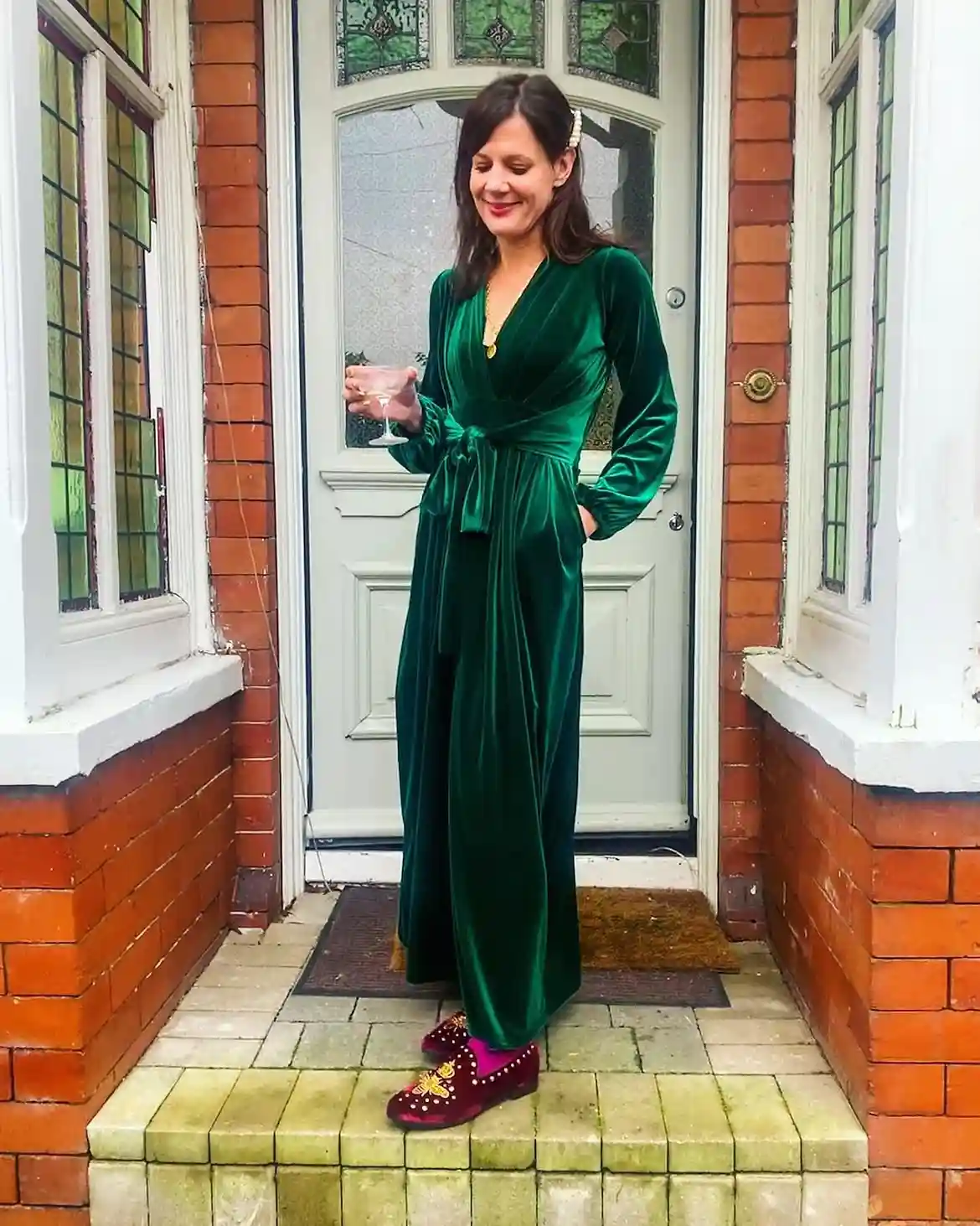 15 Velvet Outfits for Women Over 40 to Wear All Season 15 14. Emerald Velvet Wrap Outfit With Embellished Loafers