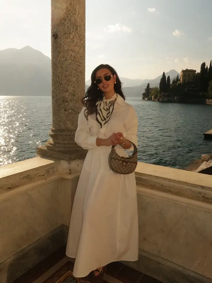 15 European Vacation Outfits for Women Over 40 4 Oversized White Shirt with a Full White Maxi Skirt