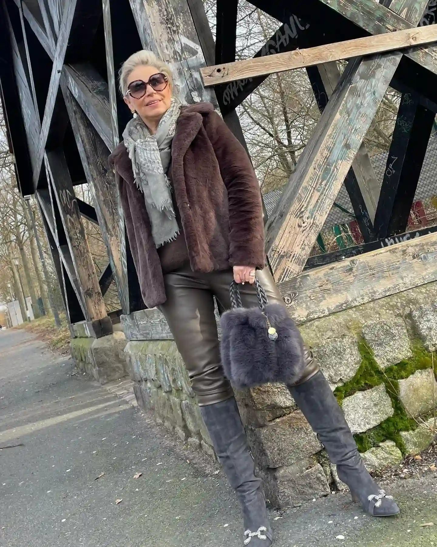 4. Brown Faux Fur Jacket with Shiny Trousers and Grey Suede Boots