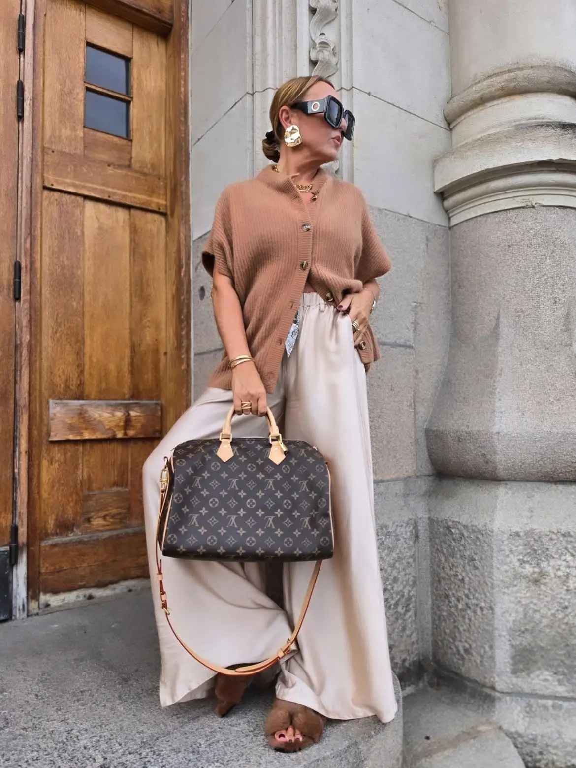 15 Cashmere Outfits for Women Over 40 That Feel Cozy and Polished 14 13. Camel Ribbed Cardigan With Wide Cream Satin Pants