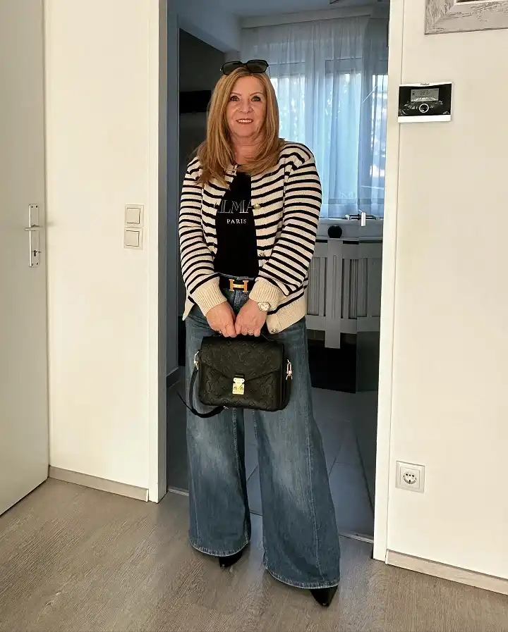 20 Classy Outfits for Women Over 40 14 Striped Knit Cardigan with Wide Leg Jeans
