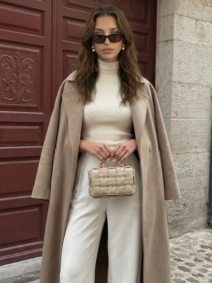 20 Quiet Luxury Outfits for Women Over 40 (Old Money Style, Real-Life Ready) 15 Taupe Coat Over a Cream Knit and Trousers