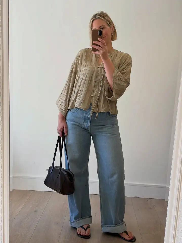 20 Work Outfits for Women Over 40 That Look Effortlessly Polished 18 Crinkle Pleated Khaki Blouse with Rolled Light Jeans