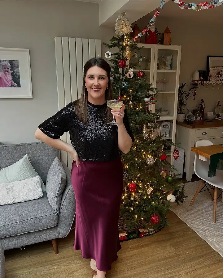 Black Sequin Tee With a Plum Satin Skirt
