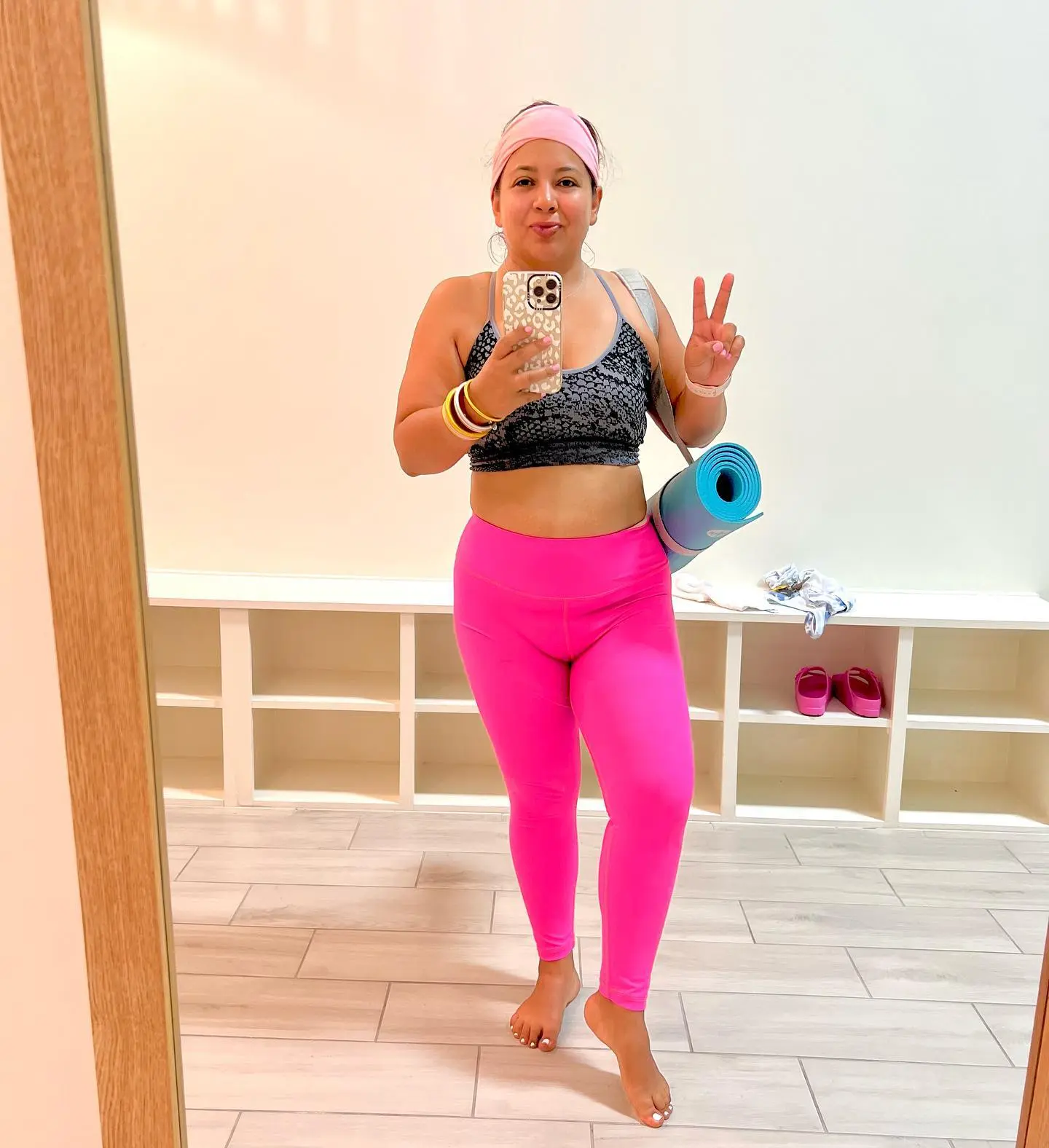 Pilates Outfits for Women Over 40: 10 Looks That Stay Put 11 10. Printed Sports Bra with Neon Pink Leggings