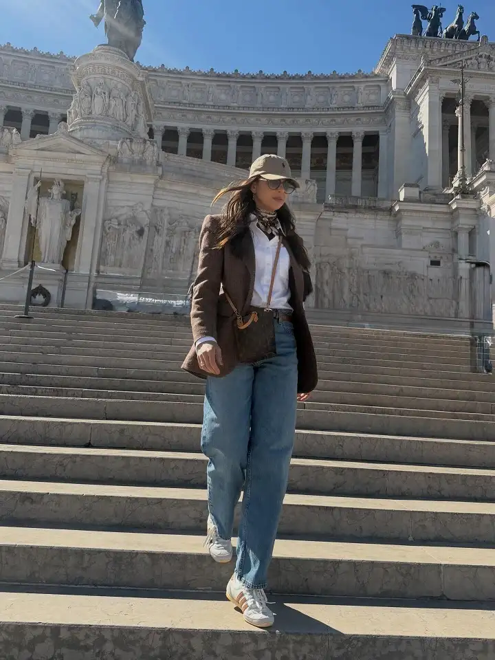 17 Italy Vacation Outfits for Women Over 40 That Look Effortlessly Chic 12 Brown Check Blazer, White Shirt, and Straight Jeans
