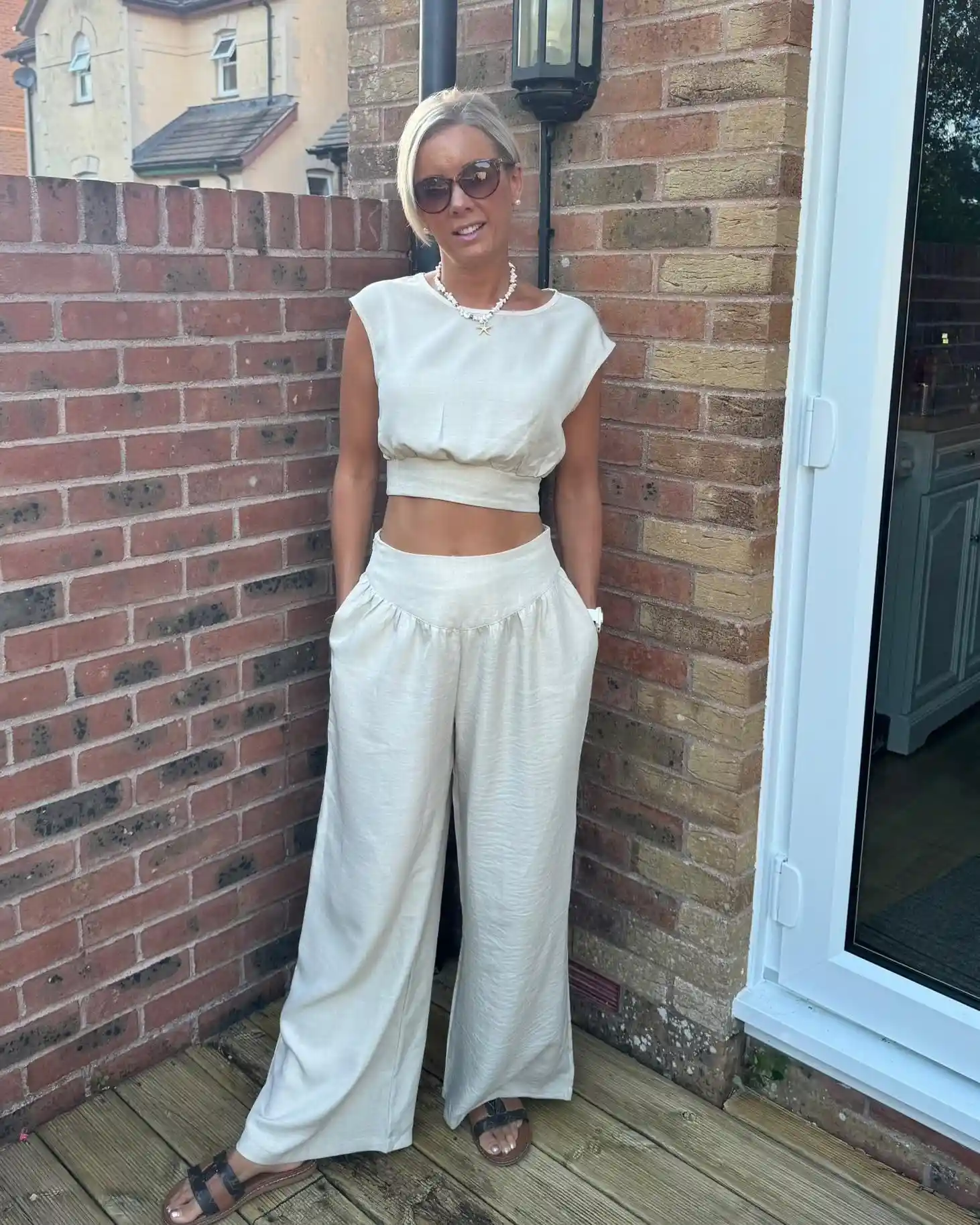 5. Beige Cropped Top And Wide Leg Trouser Set