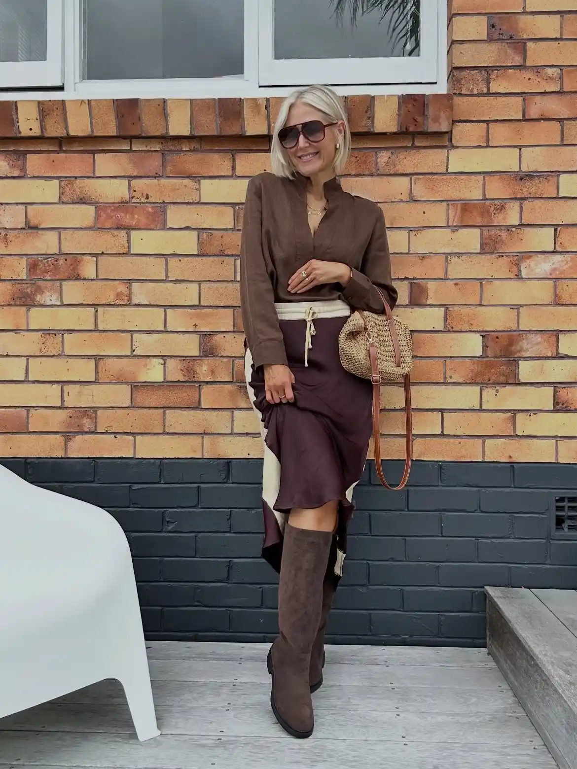 14 Knee-High Boot Outfits Over 40 11 10. A Ruffled Midi Skirt Grounded by Suede Boots