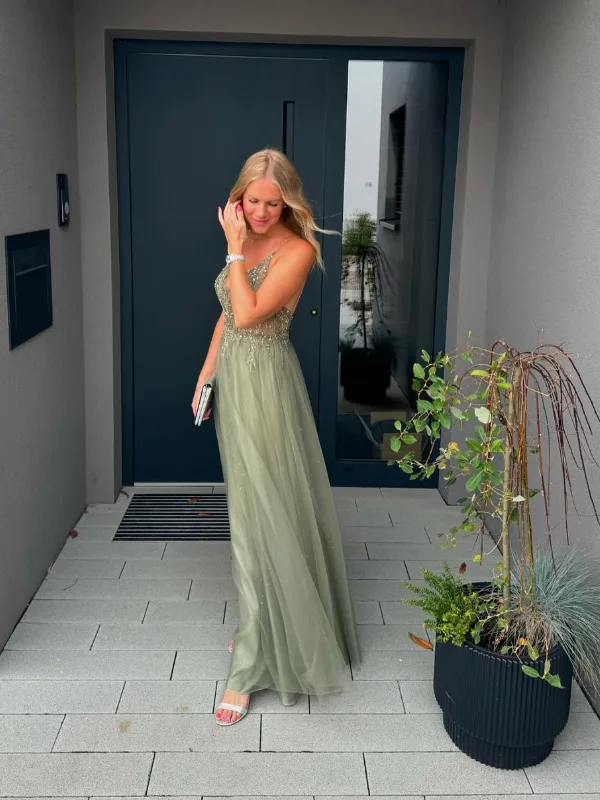 17 Fall Wedding Guest Dresses Over 40 That Look Expensive 16 15. Sage Tulle Gown With a Beaded Bodice