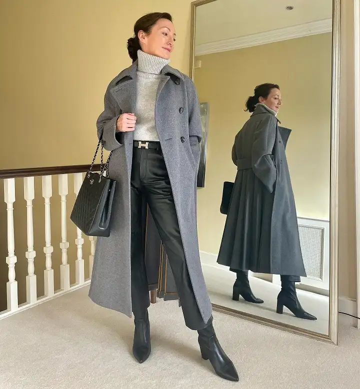 20 Chic Winter Outfits for Women Over 40 That Aren't Frumpy 11 Grey Wool Coat With Leather Trousers