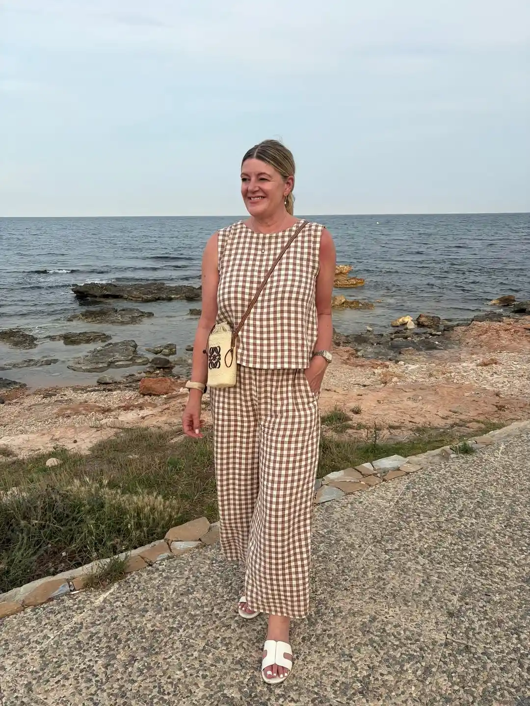 19 Holiday Outfits for Women Over 40 That Work for Parties, Dinners, and Sunny Trips 11 10. Matching Gingham Set for a Relaxed Holiday Meal