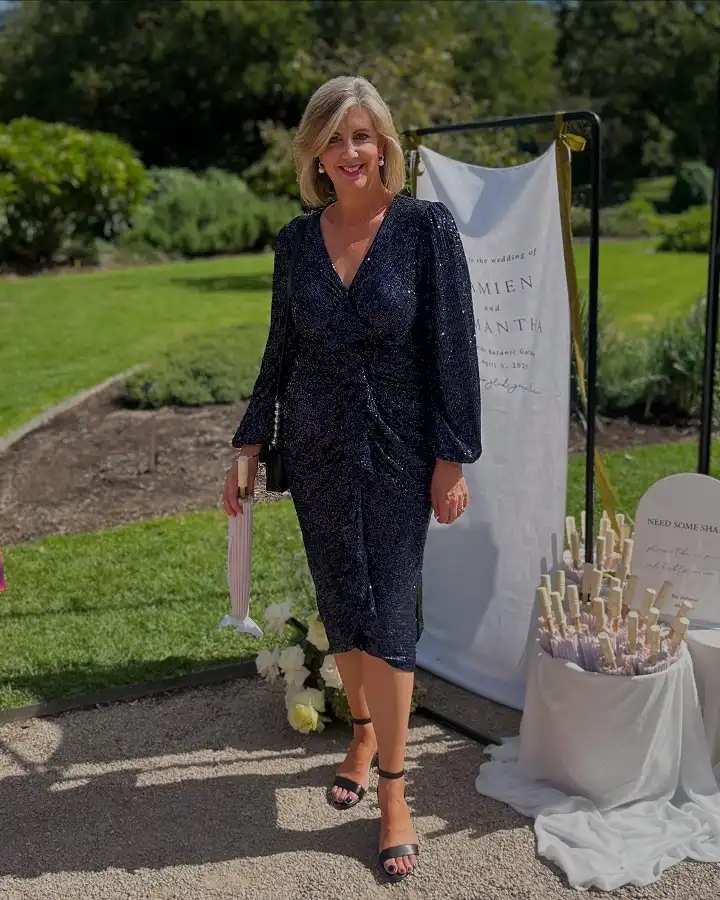 18 Retirement Party Outfits for Women Over 40 (Casual to Formal) 18 Navy Sequin Midi With Balloon Sleeves