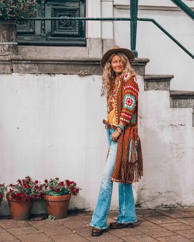 18 Boho Outfits for Women Over 40 (Not Costume-y) 18 Granny Square Crochet Cardigan with Flare Jeans