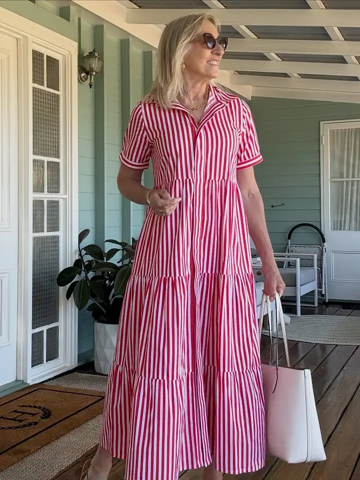 20 Work Outfits for Women Over 40 That Look Effortlessly Polished 10 Red Striped Tiered Shirt Dress