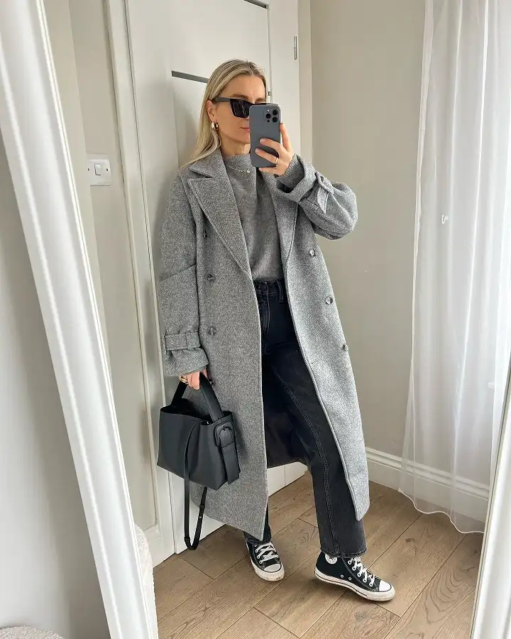 20 Chic Winter Outfits for Women Over 40 That Aren't Frumpy 2 Grey Herringbone Coat With Black Sneakers