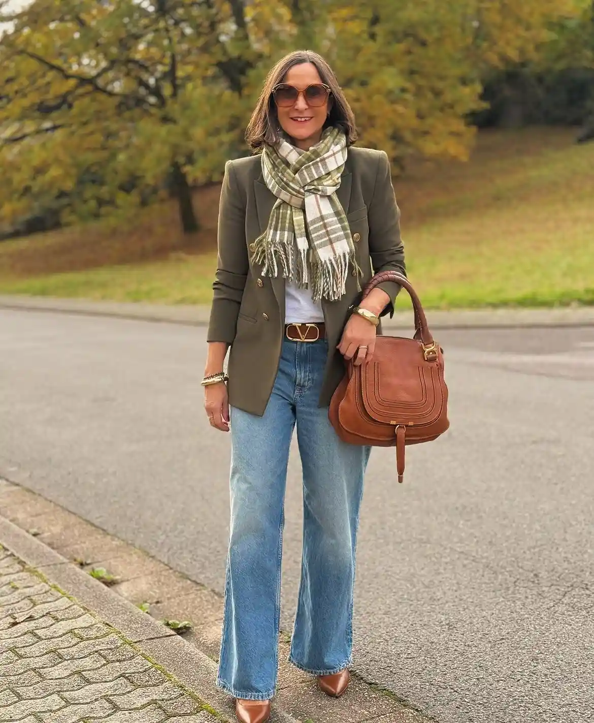 Modern Style: 20 Fall Outfits for Women Over 50 6 5. Olive Blazer with Plaid Scarf and Flare Jeans